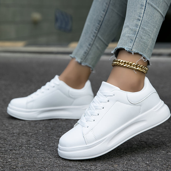 Zapatillas de mujer en piel blanca