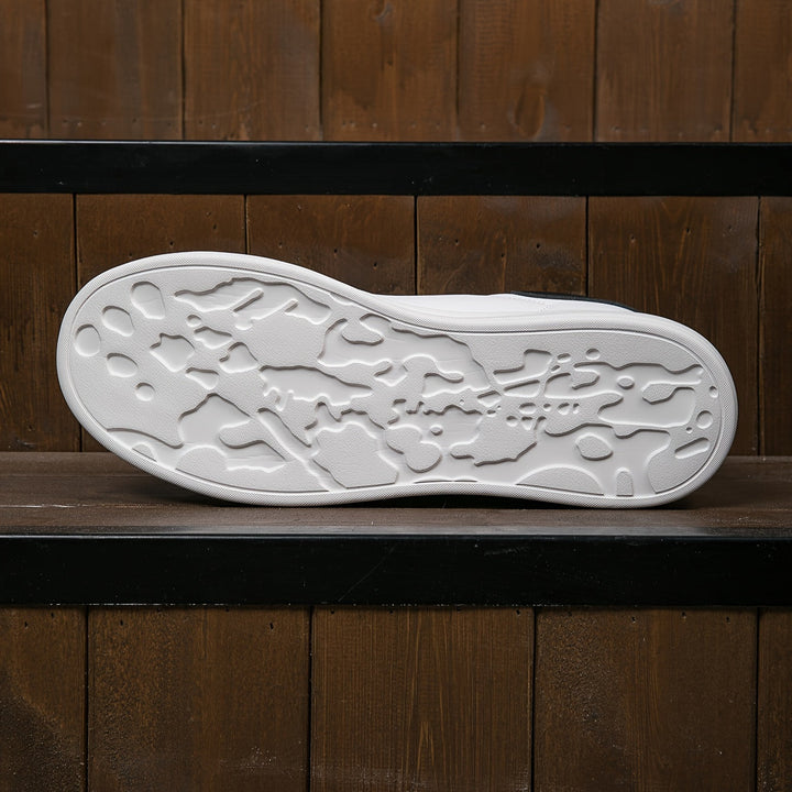 Zapatillas de mujer en piel blanca