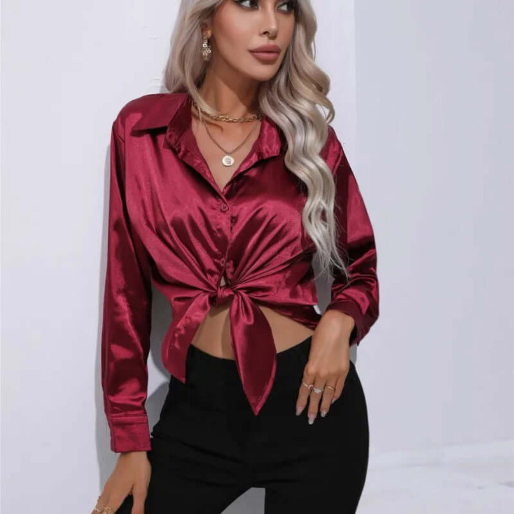 Women's satin blouse with long sleeves and loose fit