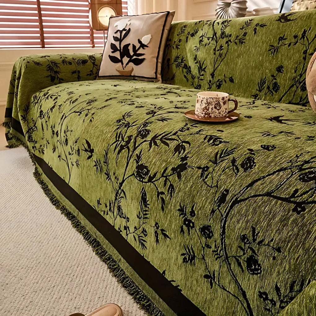 Elegante coperta con motivo floreale e frange