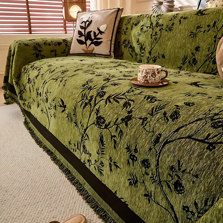 Elegante coperta con motivo floreale e frange