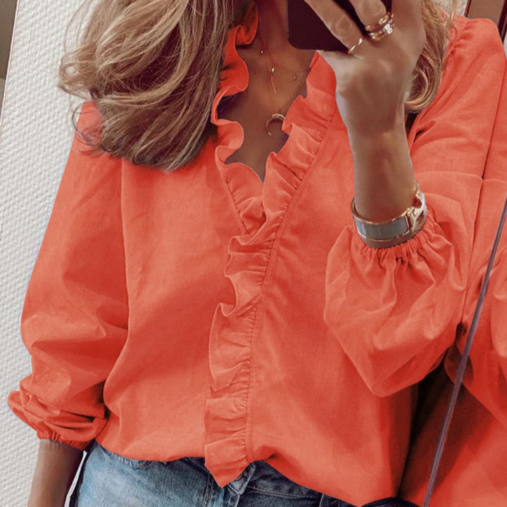 Camicetta con volant color verde agua y mangas abullonadas