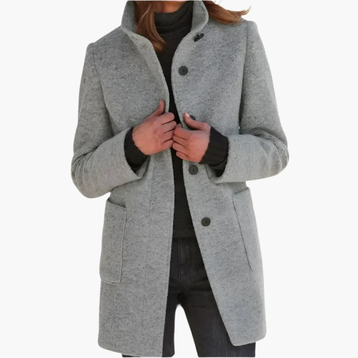 Cappotto da donna con colletto alto e tasche