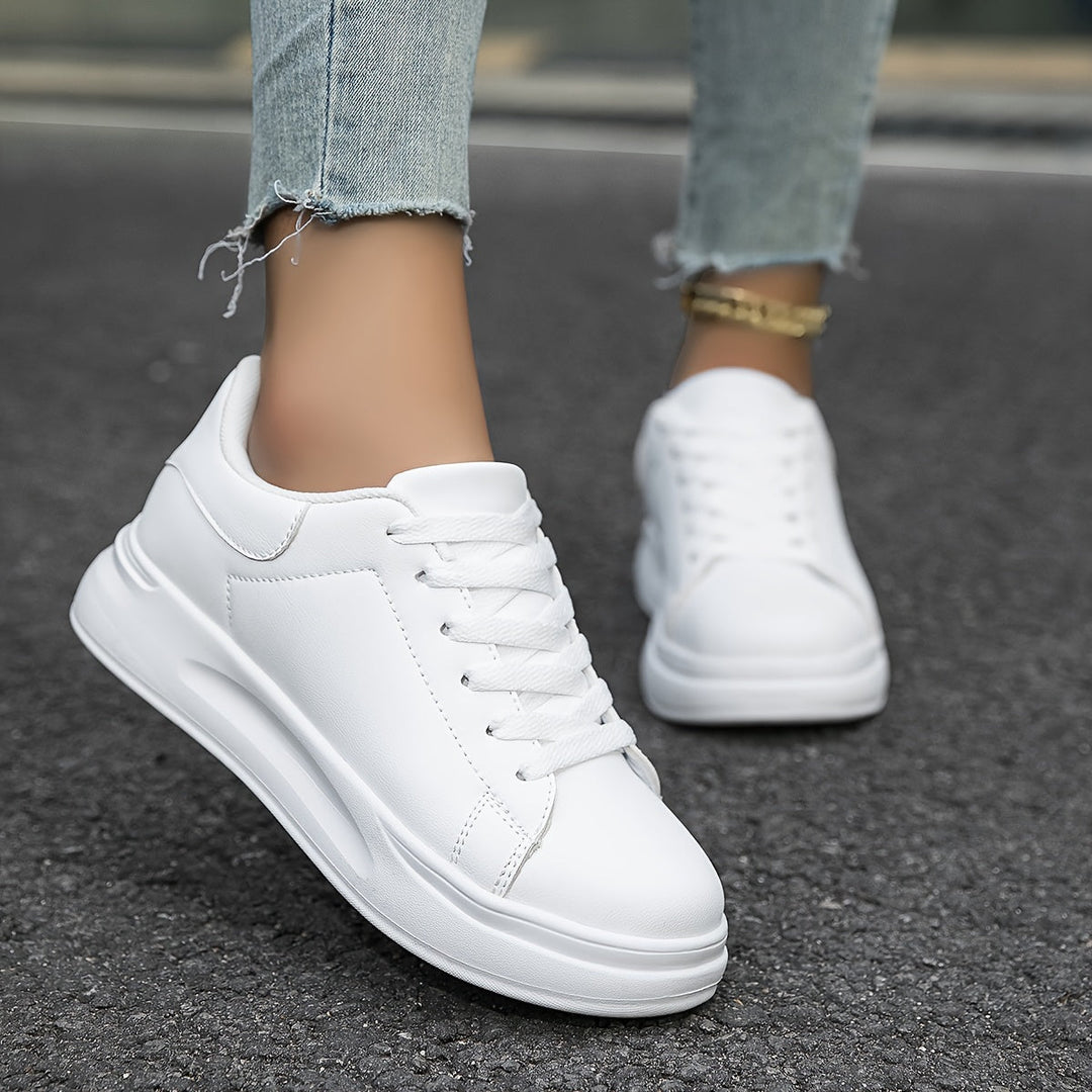 Zapatillas de mujer en piel blanca