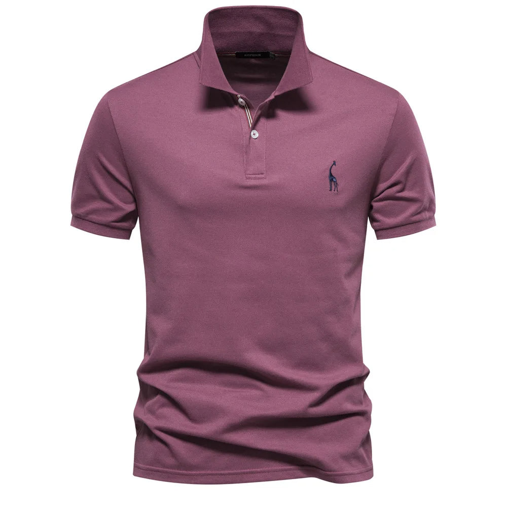 Polo in cotone di lusso con ricamo a forma di cervo