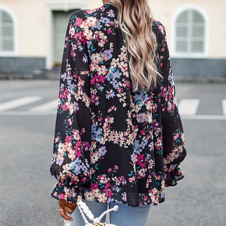 Blusa con estampado floral y escote en V para mujer
