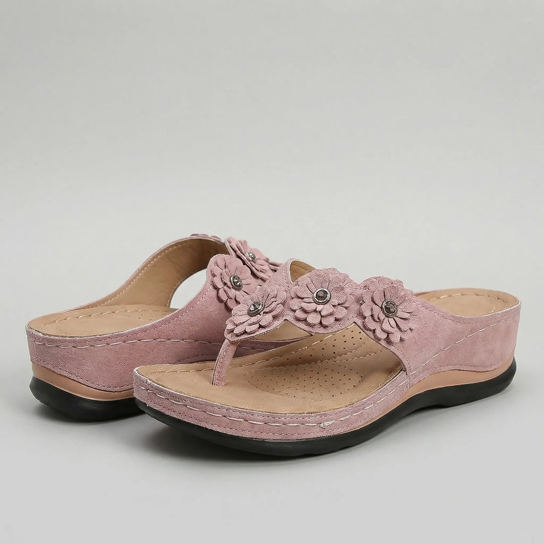 Blossandra - Sandali infradito con zeppa e dettagli floreali