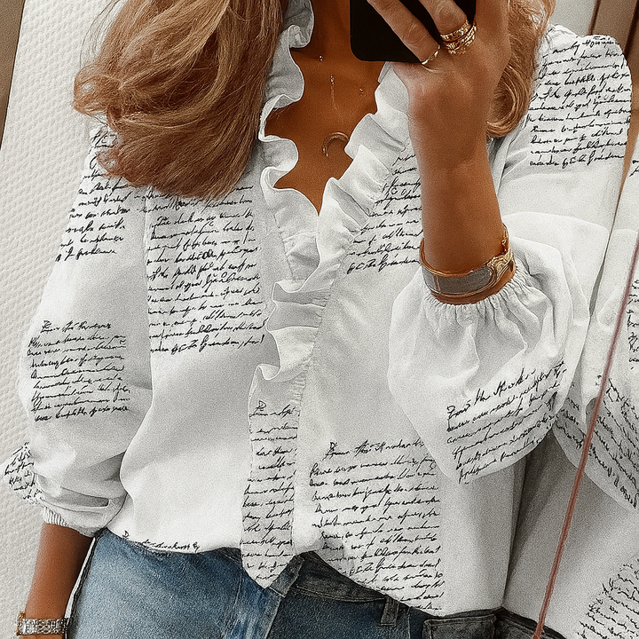 Camicetta con volant color verde agua y mangas abullonadas