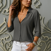 Women's blouse with buttons and V-neck