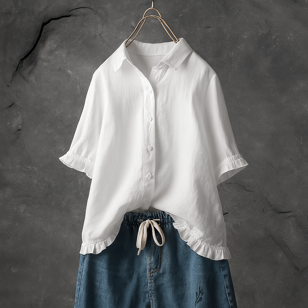 Cotton blouse with buttons and gathered hem