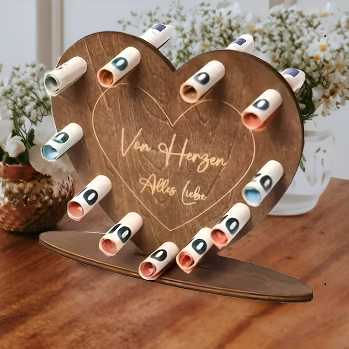 Scatola regalo in legno a forma di cuore con lettera d'amore e contanti