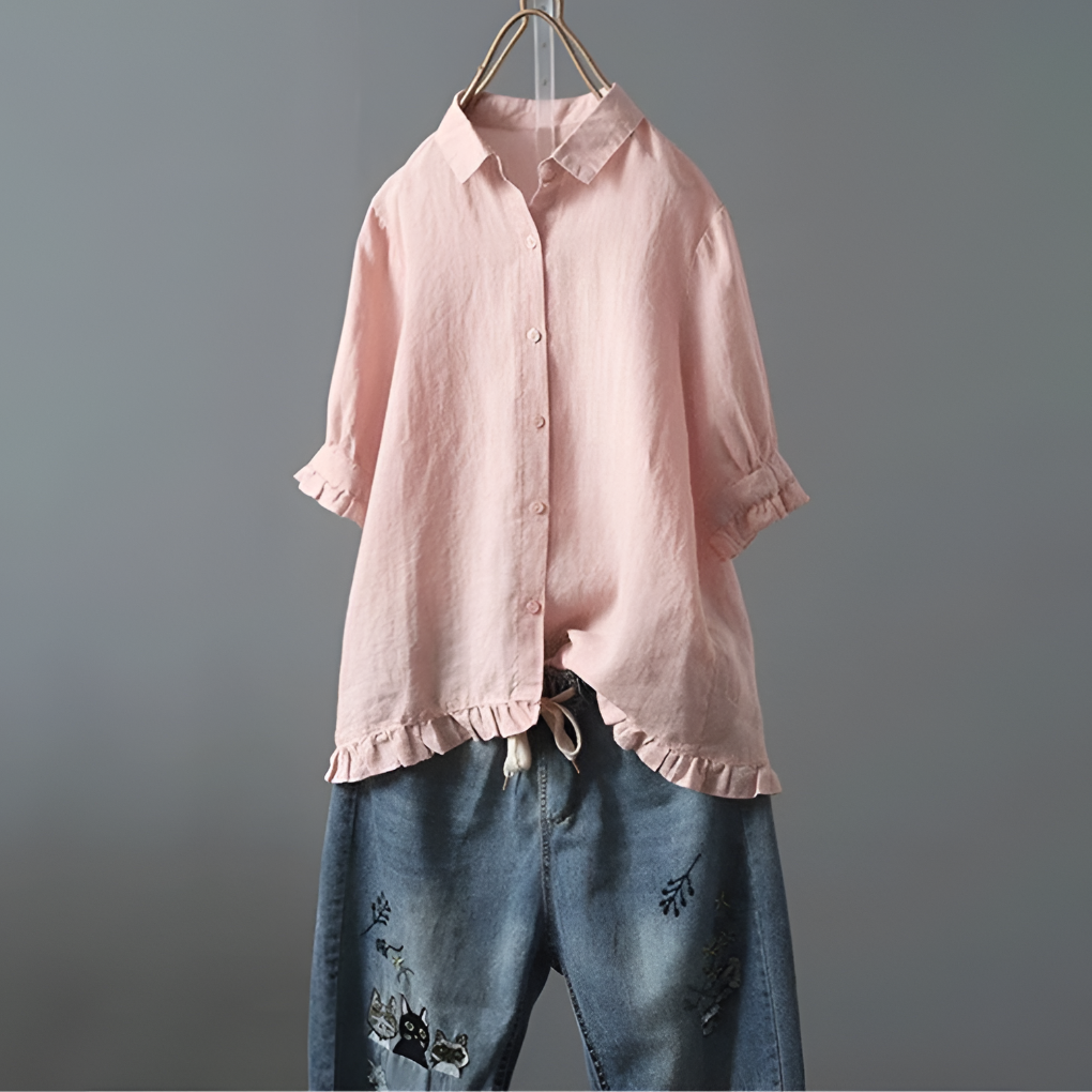 Cotton blouse with buttons and gathered hem