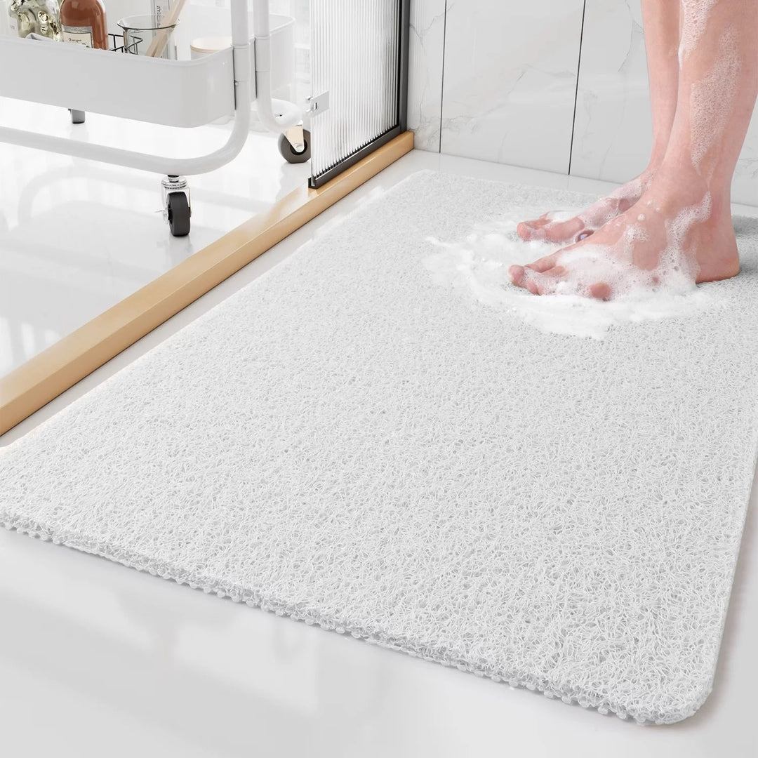 Alfombra de baño antideslizante en PVC con superficie suave para masaje de pies