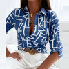 Women's blouse with pointed collar tailored to fit